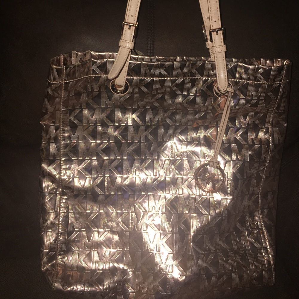 A rose gold long bag